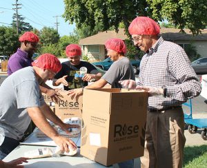 Santa Clara Chiropractor Funds Meal Assembly Party to Celebrate Business Anniversary