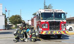 Sirens Announce Fire Engine Crew Operation Demonstration at Fire Station 2
