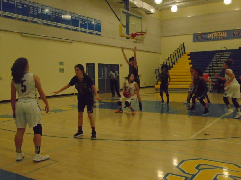 Chargers Get Better of Rival Bruins, 42-33