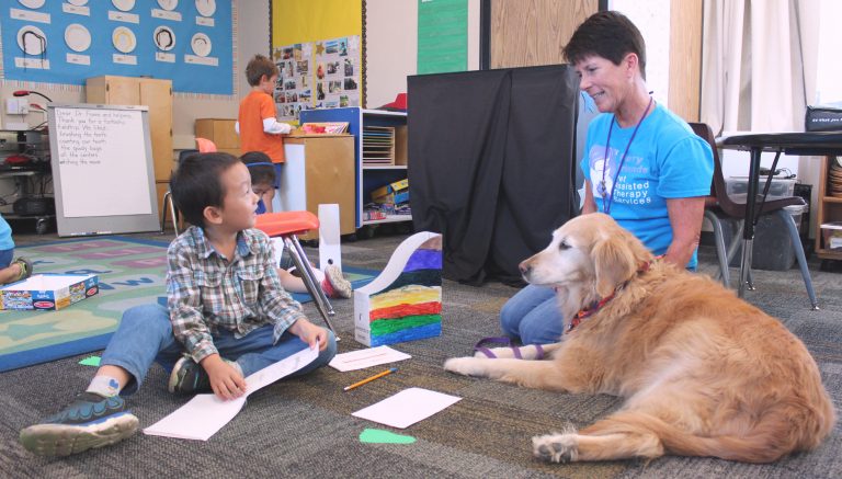 Washington Open Elementary School’s Kindergarten Students Buddy Up With Furry Friends