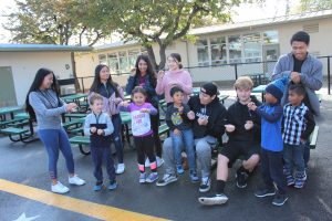Kindergarten Students Learn American Sign Language from High School Students