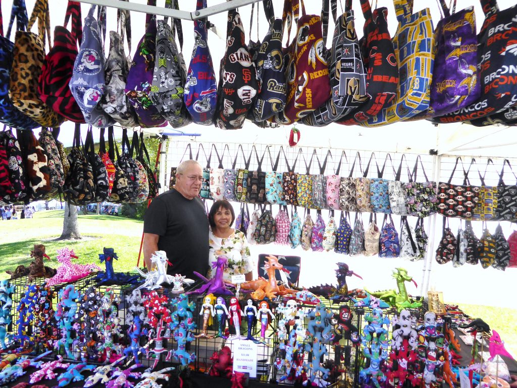 The 2019 Santa Clara Art & Wine Festival at Central Park featured vendors like the Dragon Flame Shop. The Spazmatics band played.