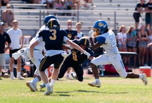 Bruins Claw Past Menlo 16-14