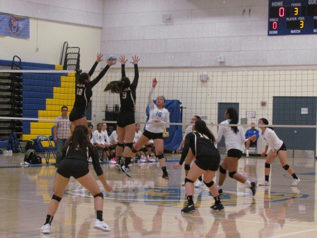 The Wilcox Chargers volleyball team eclipsed the Santa Clara Bruins. Wilcox's Amanda McDowell and Santa Clara's Kayla Chew talk after the game.