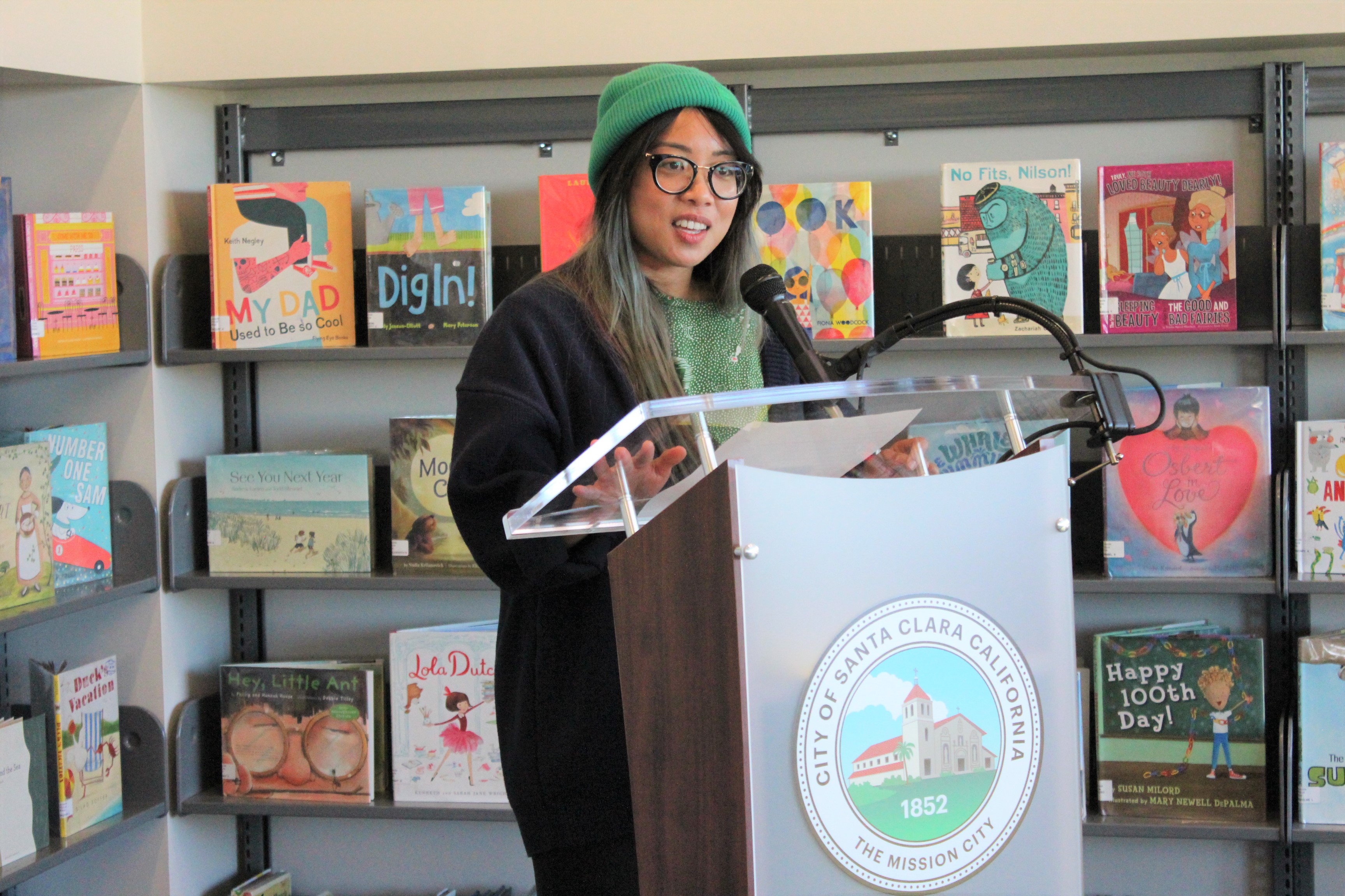 Artist Genevieve Santos and her new mural bring joy to Santa Clara's Northside Library. There was a ribbon cutting in the children's area.