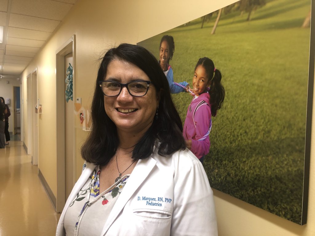 Kaiser Permanente Nurse. Debbie Marquez, jumped into action to help a person who went into cardiac arrest at a movie theatre.