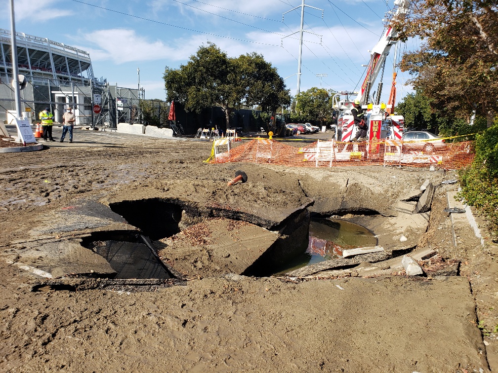 A sinkhole developed and ate two cars at the VTA parking lot near Santa Clara's Levi’s Stadium. The City says a water pipe leak occured.