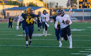 Wilcox Rides Horses to Win Over Trojans