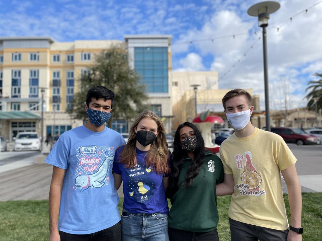 Sahana Prem, Mila Quiñonero Koch, Blake Levin, and Ayush Maurya, with Interact, worked together to help small businesses and charity.