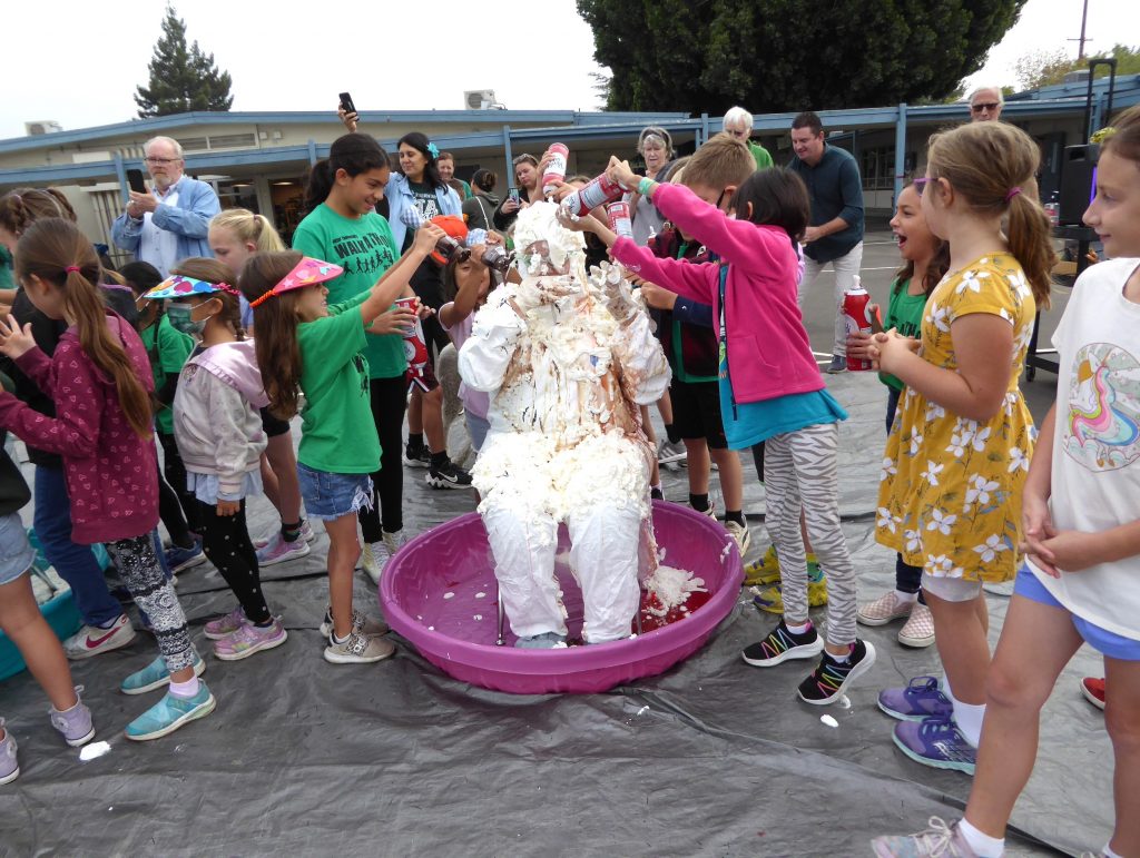 Thanks to strong fundraising efforts, Sutter Elementary School students got to turn their principal and teacher into human ice cream sundaes.