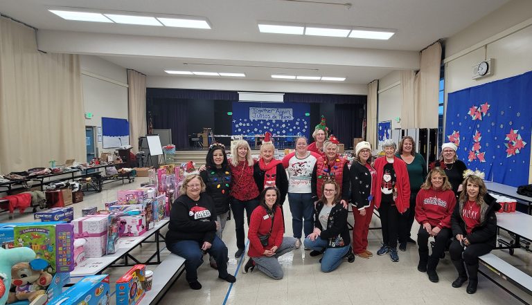 Soroptimists Make Holidays Bright for Families in Need
