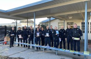 SCPD Officers Read to Scott Lane Students