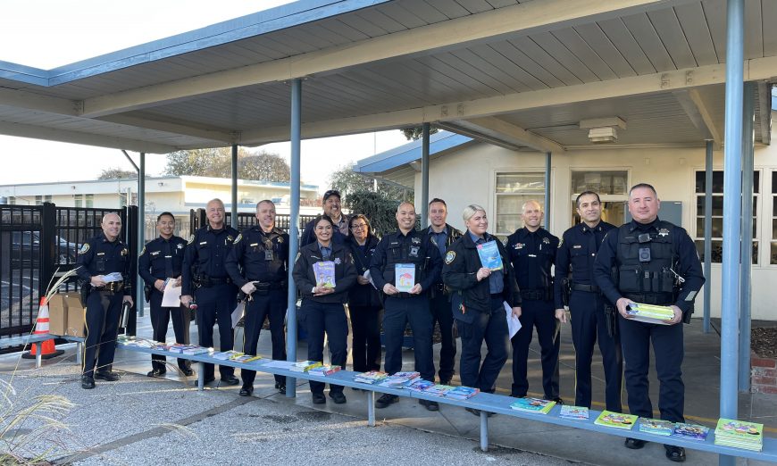Santa Clara police officers visited Scott Lane Elementary School to read to classrooms and deliver new books in time for the holidays.