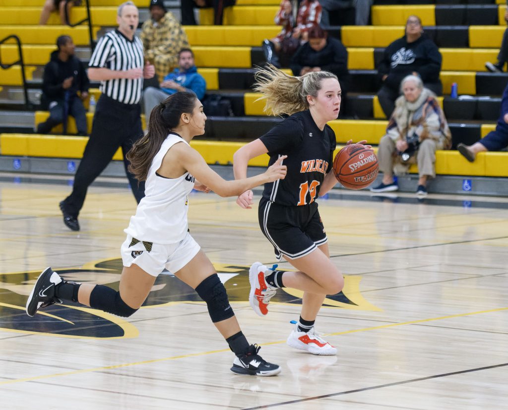 The Wilcox Chargers won its opening game of the Del Mar Tournament on Dec. 27 with a frantic 36-34 win over the Woodside Wildcats.