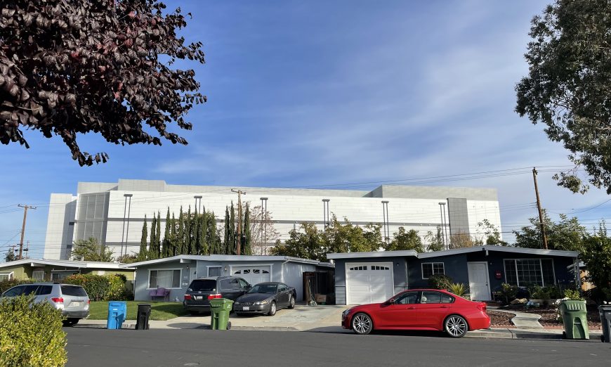 The six-story data center on Memorex Drive creates an imposing sight for single-family homeowners who live on Main Street in Santa Clara.