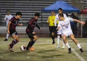 Bruins Outlast Firebirds in Rain Soaked League Opener 