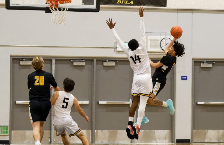 Chargers Keep Plugging Away, But Fall to Spartans