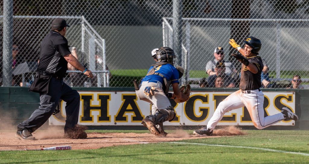 The Chargers beat the Eagles 9-4 on Thursday, helping freshman pitcher Eliah Laureles win his first win with the varsity squad.