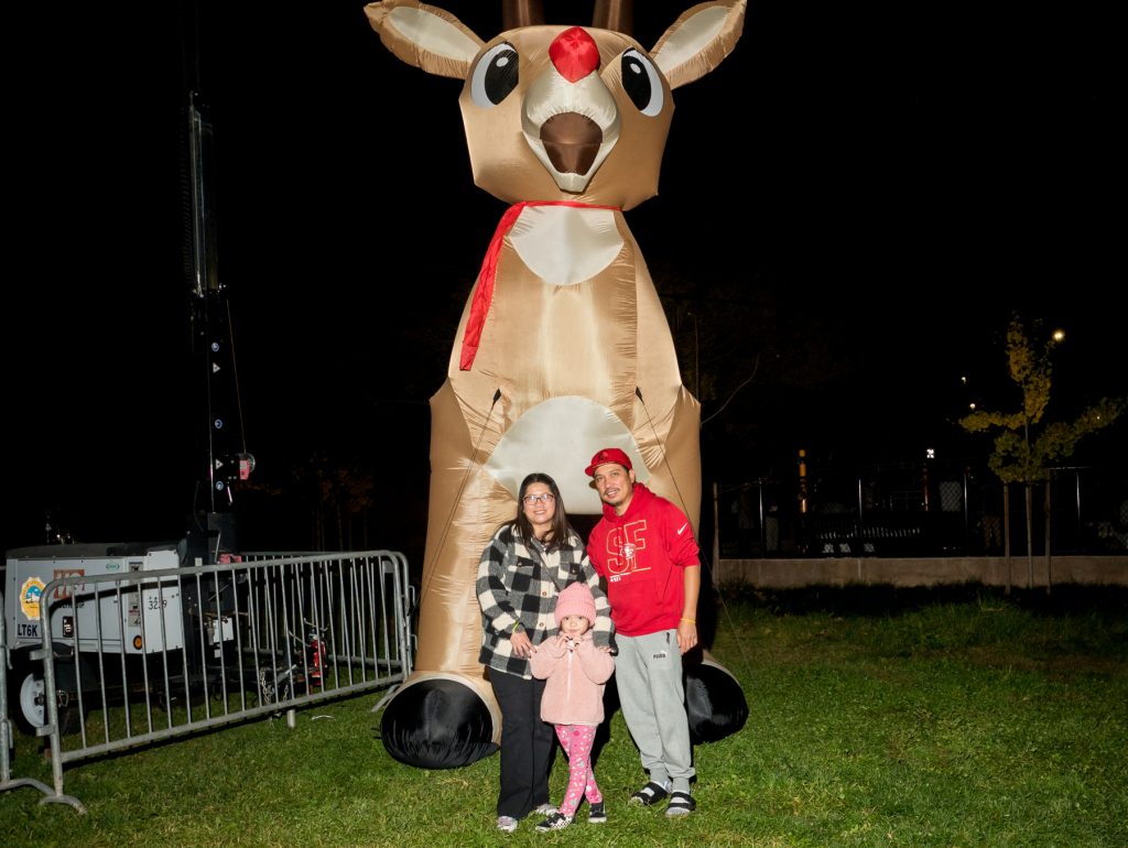 Community member Mike Walke pushed the button and lit the tree at Santa Clara's Central Park, upholding a more than a century old holiday tradition.