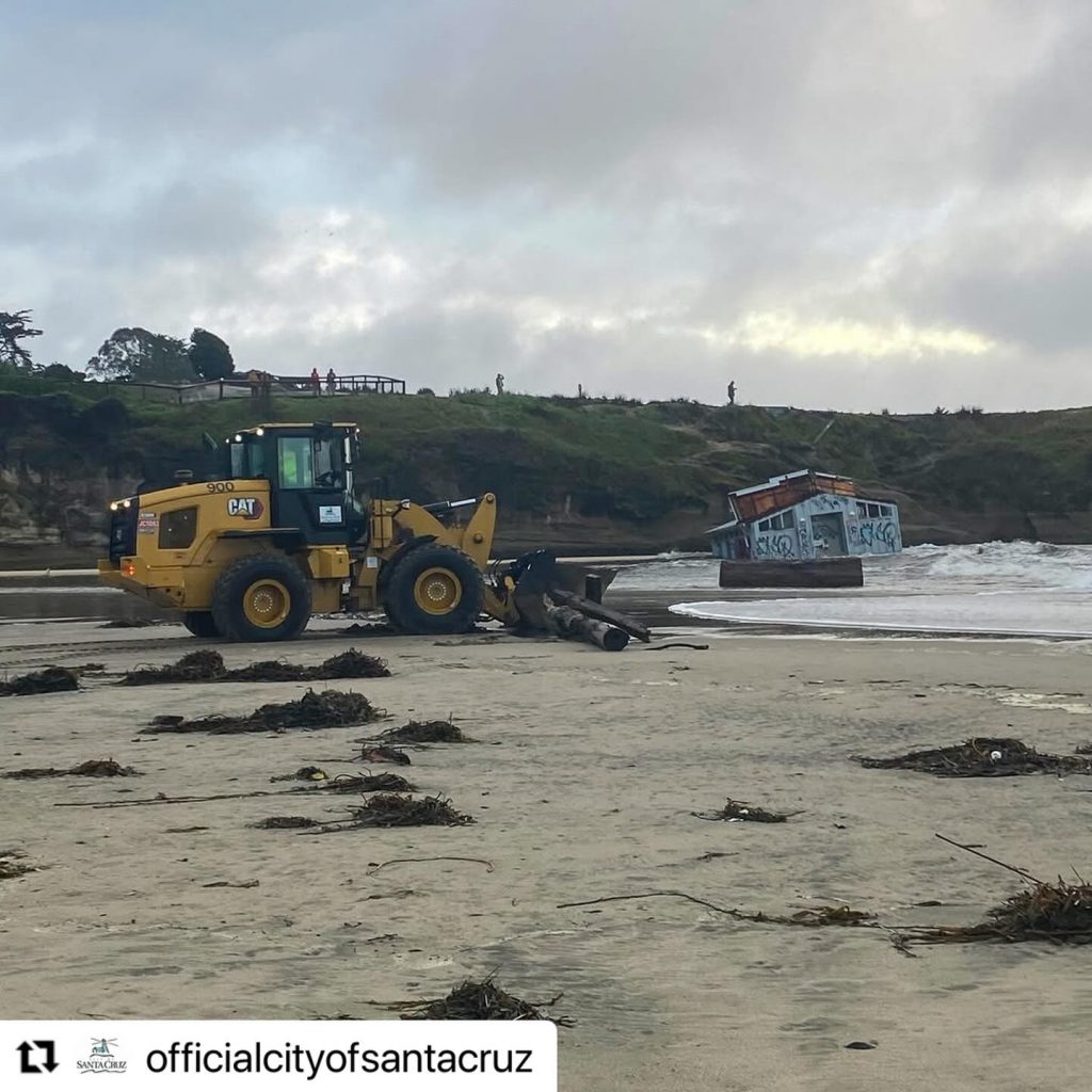 Santa Cruz city officials powerful waves caused the municipal wharf to collapse and it will take several weeks to clean up the debris.