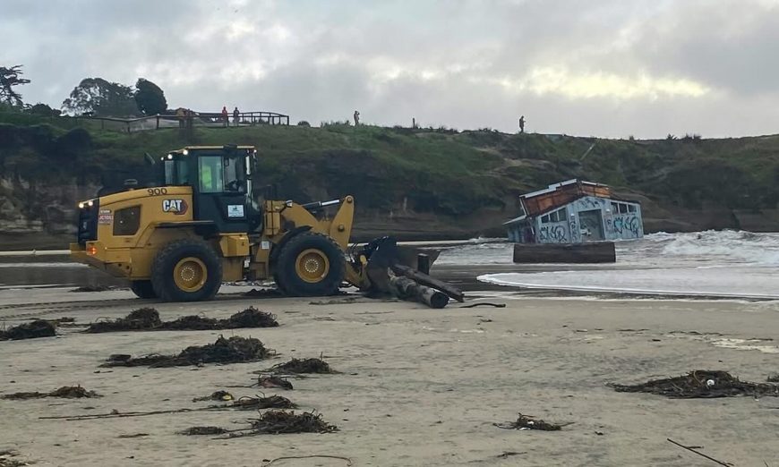 Santa Cruz city officials powerful waves caused the municipal wharf to collapse and it will take several weeks to clean up the debris.