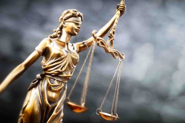 The DOJ says Santa Clara business owner John Comeau will serve 366 days in prison for more than $1.1 million in unpaid taxes.