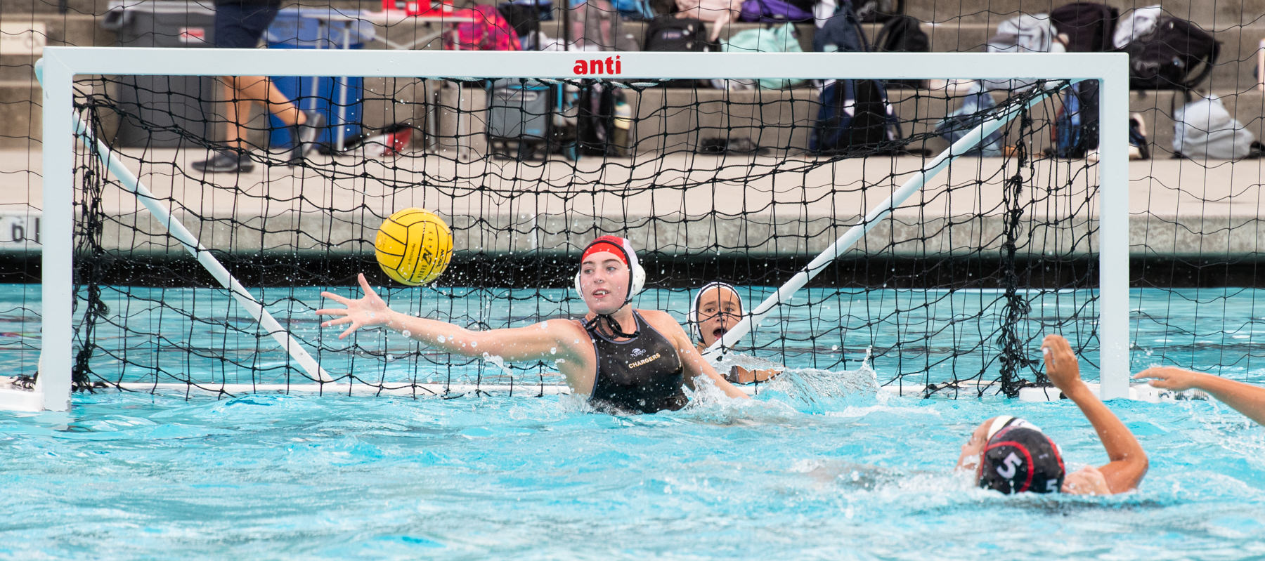 The Wilcox Chargers water polo team beat the Gunn Titans 9-8 on Sept. 30 thanks in part to strong play by Heidi Dang and Allison Gardner.