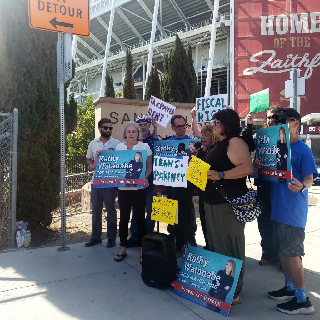 Santa Clara Mayoral candidate Watanabe at a press conference by the Coalition for Community Engagement called out the stadium finances.